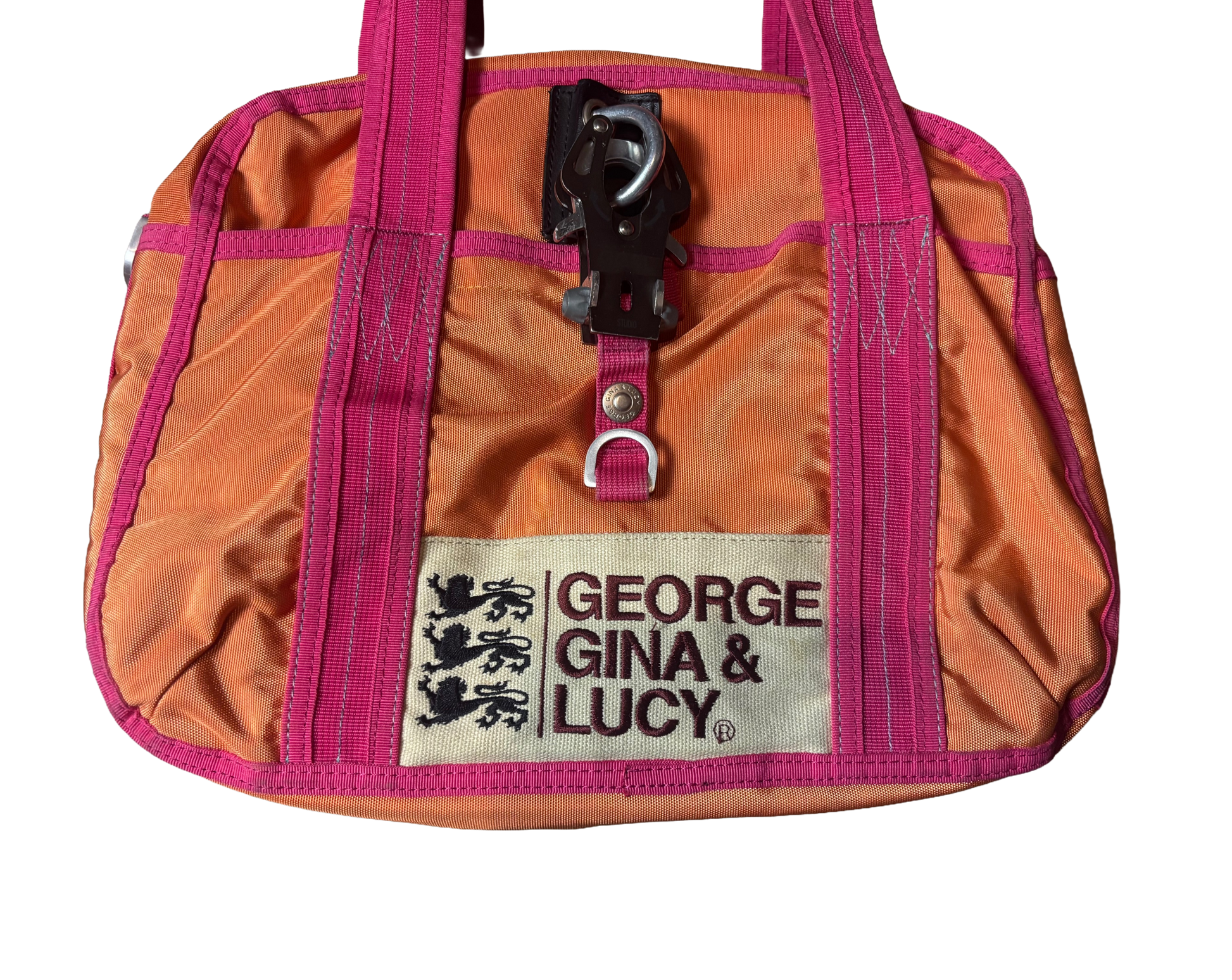 Orange and pink bag with 'George Gina & Lucy' label on a white background